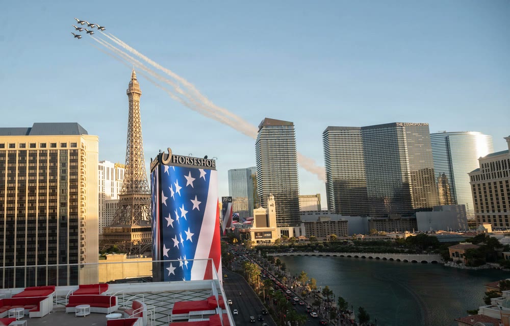 U.S. Air Force Thunderbirds flying over the Las Vegas Strip near the Eiffel Tower and Cosmopolitan during the America250 flyover